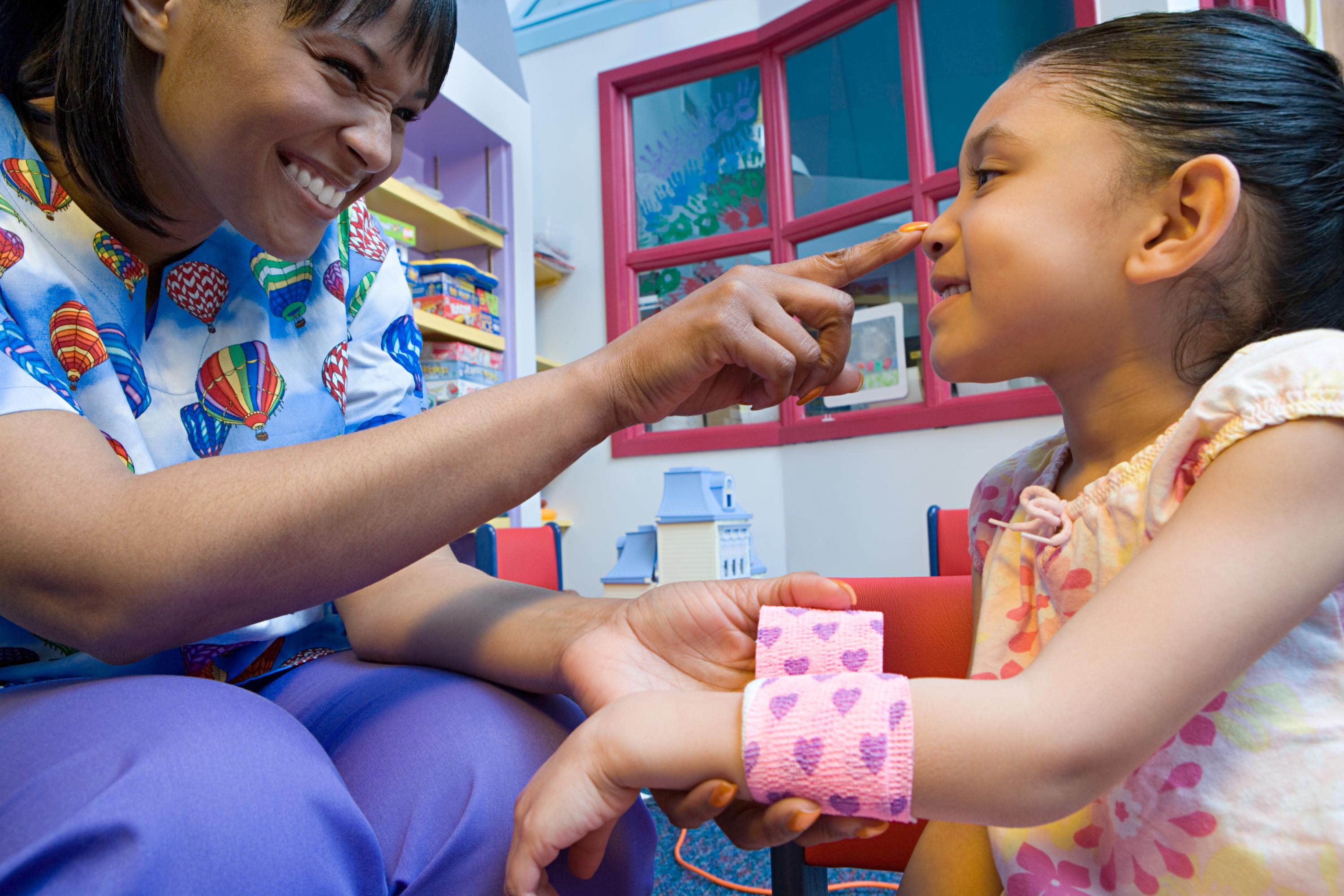 nurse treating a patient