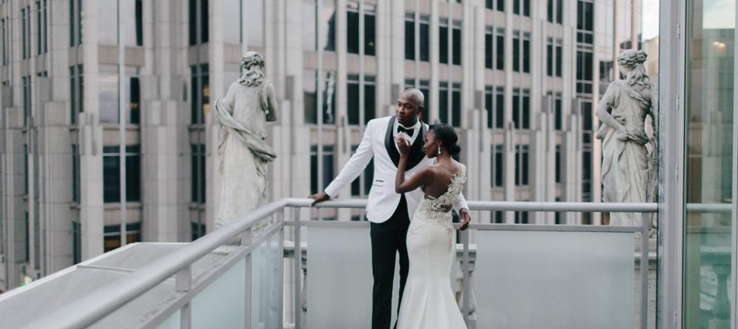 bride and groom with city view