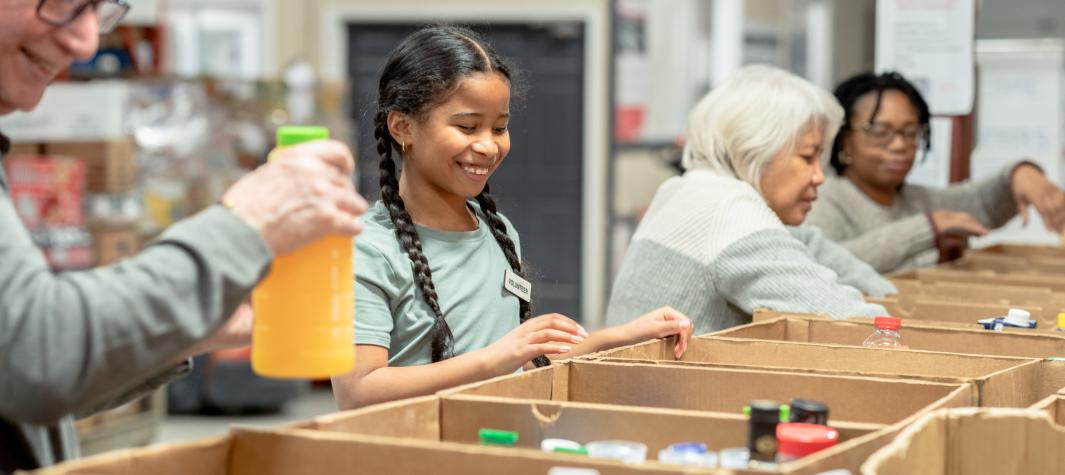 volunteers work at a food donation event